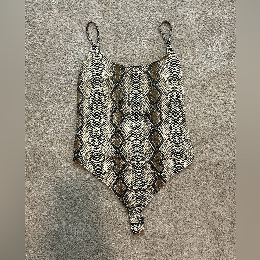 NWT Slithering Around
Bodysuit